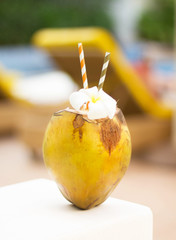 Drink in coconut on the pool