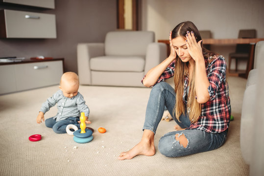 Stressed Mom And Son Together At Home