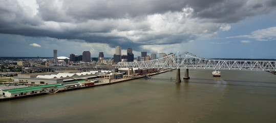 Afternoon Storm Clouds Pass Over Highway Bridges Barges Moving Waterfron New Orleans