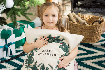 Little girl on Christmas background
