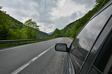 We are driving a car on the roads of western Ukraine.