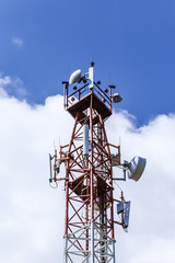 Communications tower  complete with various antennas and microwave and satellite dishes