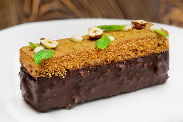 Sweet dessert with berries and herbs on a plate