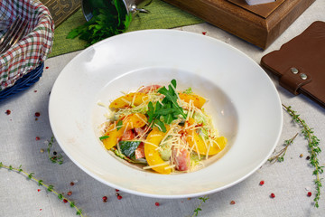 Vegetable salad in a plate in a cafe, dinner in a restaurant