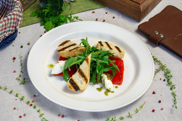 Vegetable salad in a plate in a cafe, dinner in a restaurant