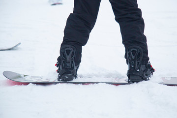 snowboarder rides a snowboard