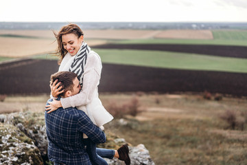 Romantic pretty young couple have fun outdoor.