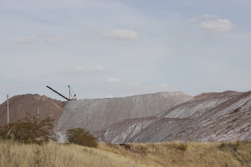 mountains of salt and a crane upstairs. Extraction of minerals.