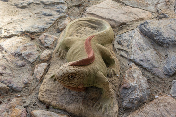 decorative lizard on stone
