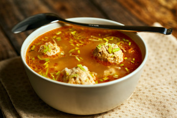 Mexican meatballs soup on a wooden board
