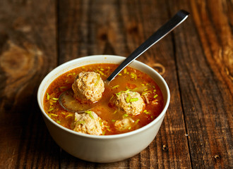 Mexican meatballs soup on a wooden board