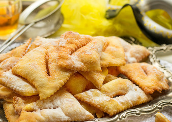 Traditional sweet crisp Angel wings with powdered sugar and rum