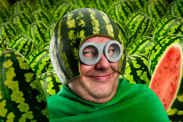 Crazy man in watermelon helmet and googles