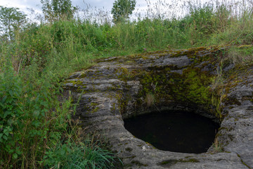 Big giant's kettle on the shore in northern Norway.