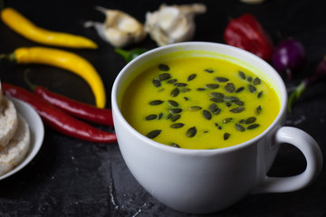 Pumpkin asian coconat cream soup. Autumn hot food