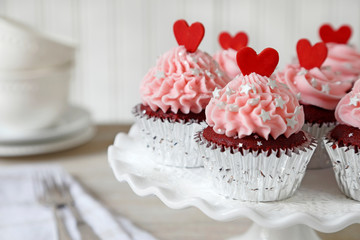 Red velvet cupcakes decorated with red hearts