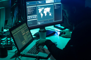 Hackers breaking server using multiple computers and infected virus ransomware. Cybercrime,...