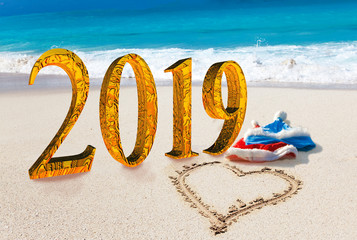 New Year inscription 2019 on the beach