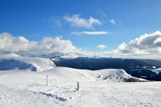 Beautiful winter landscape and viewpoint, with volacno mountain. Wilderness landscape. Auvergne