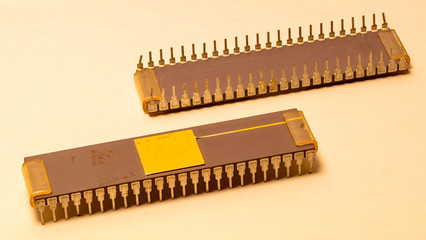 Electronic chips of integrated circuits used in the first computers and dating back to the years...