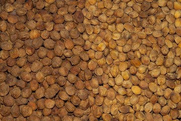 Rows of dried fruits: apricots, dried apricot, uruk. Dried fruit background.