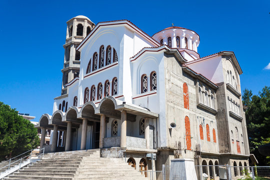 Beautiful white church with a red tile roof on the greek island of thassos