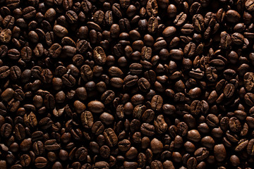 Coffee beans on the table background blurred abstract blurred