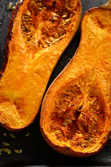 Roasted halves of squash pumpkin above