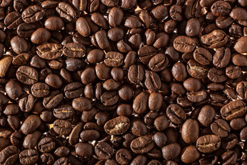 Coffee beans on the table background blurred abstract blurred