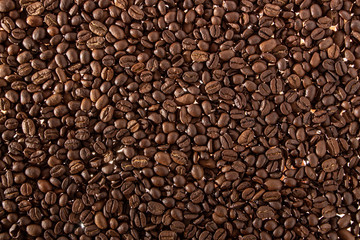 Coffee beans on the table background blurred abstract blurred
