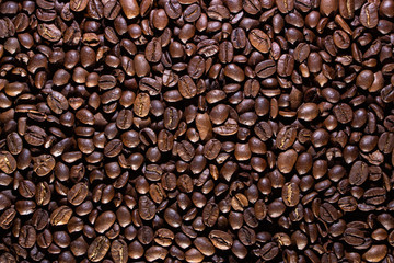 Coffee beans on the table background blurred abstract blurred