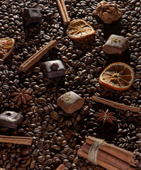 Chocolate pieces and coffee beans close up