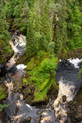 Fototapeta na wymiar Plodda Falls - waterfall in scotland