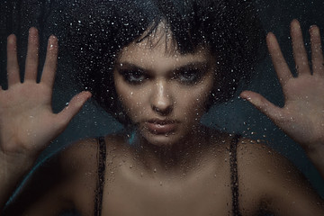 Close up portrait of young beautiful woman with provocative make up and stylish bob haircut...