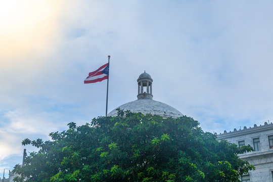 San Juan Capitol building with Puerto Rico flag in San Juan, Puerto Rico