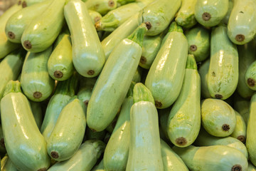 courgette  pile on a market background