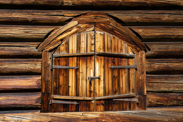 Abandoned barn vintage wooden door. Old photo of rustic house entrance