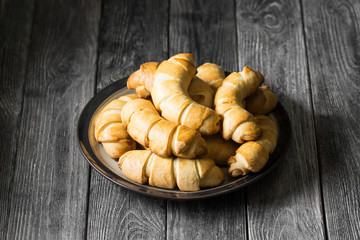 Buns on a wooden table. Rustic style