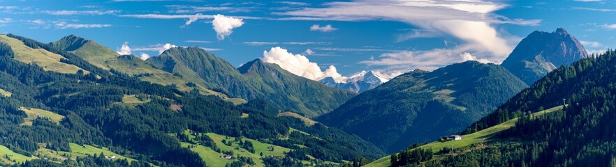 panorama of mountains with mountain pastures in front of Mt. Schneekopf