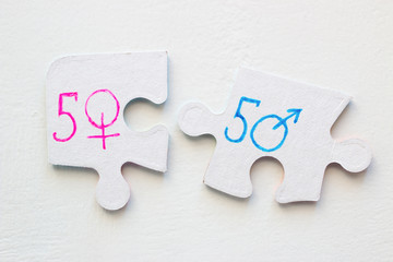 gender symbols on the puzzle close-up. concept transgender