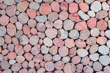 Dry old stone wall texture background close up