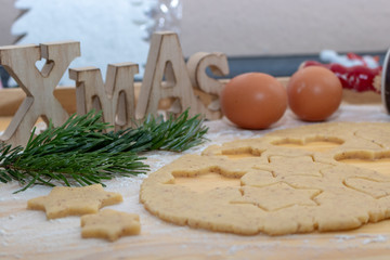 Christmas Baking background. Ingredients for cooking christmas baking on wood background