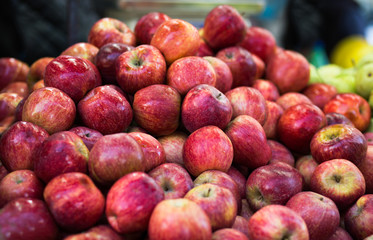 Pile of red delicious apples background.