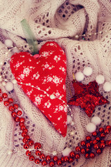 Obraz na płótnie Canvas textile handmade toy heart for Christmas. Photo