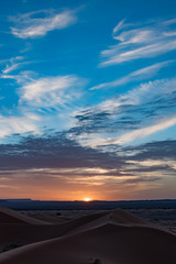 Beautiful colorful sunset in Erg Chebbi Dunes, Sahara Desert, Merzouga, Morocco, Africa