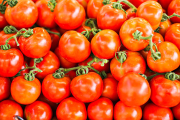 Pile of tomatoes background.