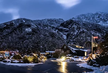 Crédence de cuisine en verre imprimé Aoraki/Mount Cook 2018, Oct 12 - New Zealand, Mount Cook Village, Night view of Mount Cook Village covered with white fresh snow after a snowy day.