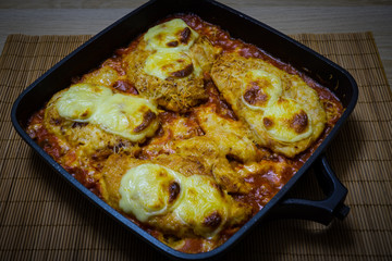Baked chicken Breasts with vegetables and cheese