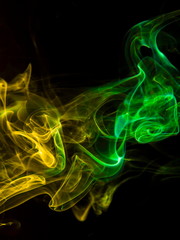Colored smoke on black background