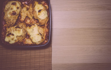 Baked chicken Breasts with vegetables and cheese